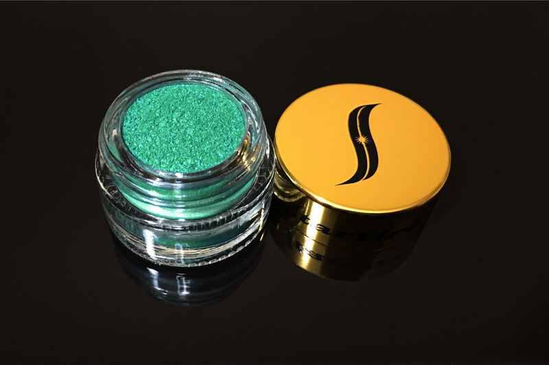 emerald green eyeshadow inside glass jar with gold top-starfire cosmetics