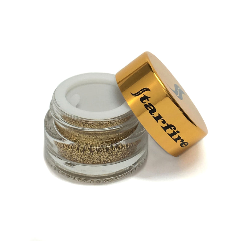 gold glitter inside open jar with gold lid-starfire cosmetics