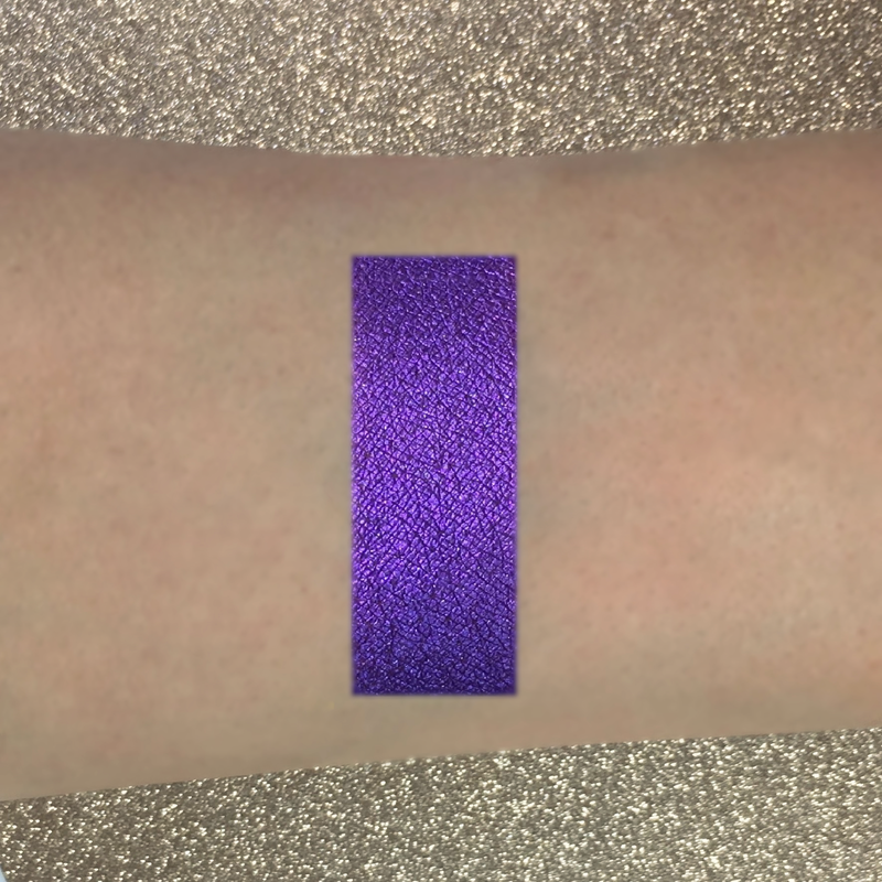 high pigmented purple eyeshadow on arm-starfire cosmetics