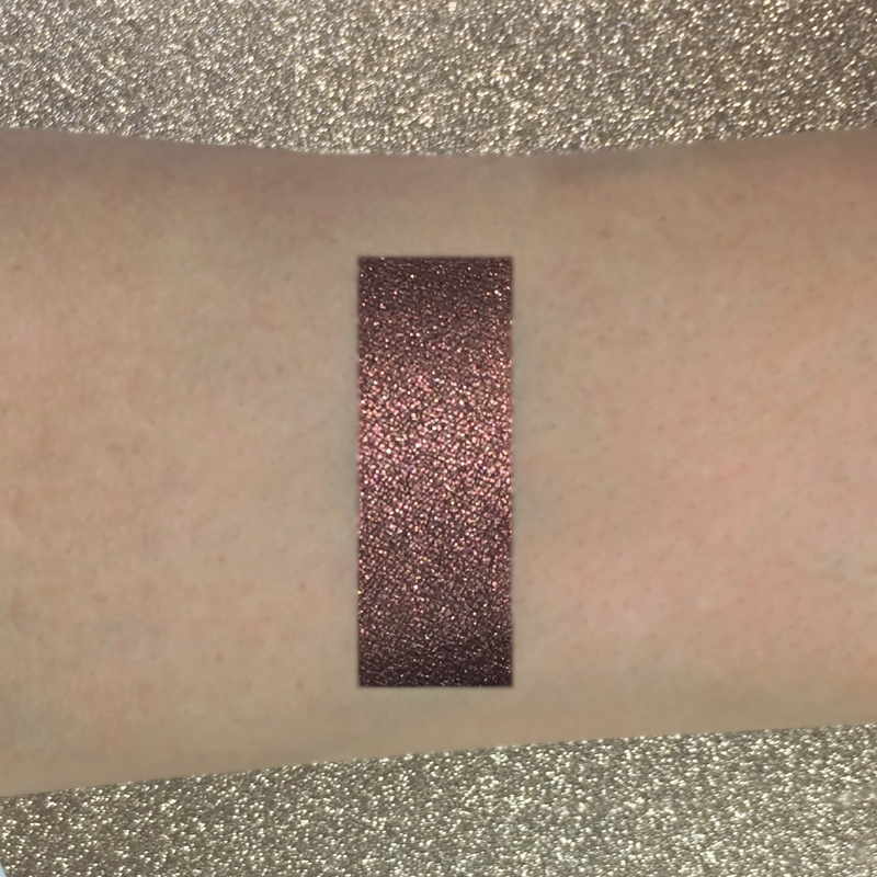 high pigmented brown eyeshadow on arm-starfire cosmetics