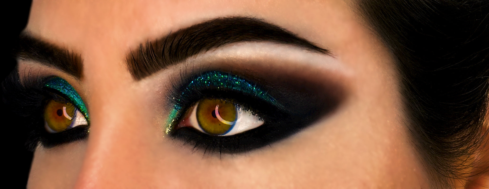smokey glitter eyeshadow makeup on woman's eyes-starfire cosmetics