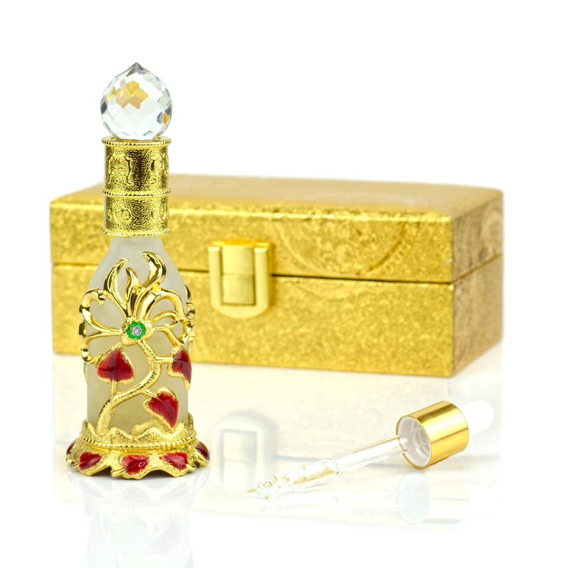 gold crystal jar with gold flake dropper in front of gold box-starfire cosmetics