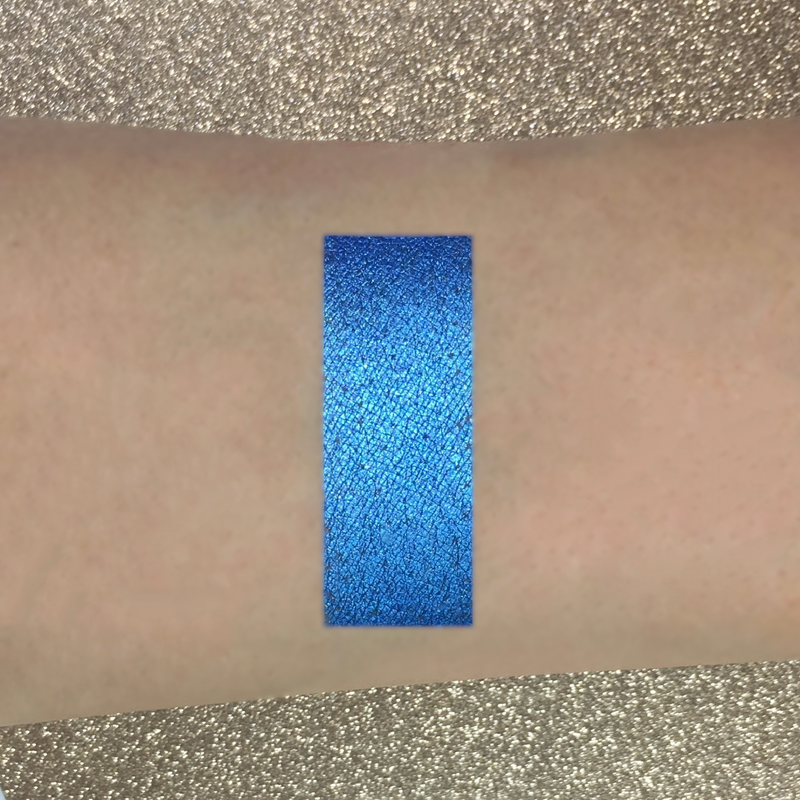 blue eyeshadow on arm-starfire cosmetics