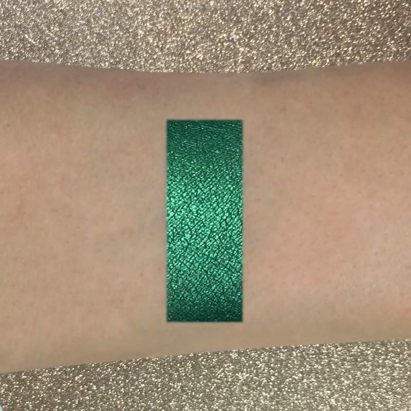 emerald eyeshadow on arm-starfire cosmetics