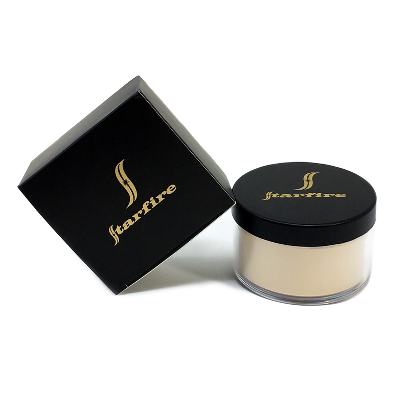 face powder with black lid next to black box-starfire cosmetics