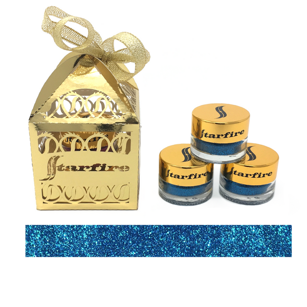 blue glitter next to gold package-starfire cosmetics