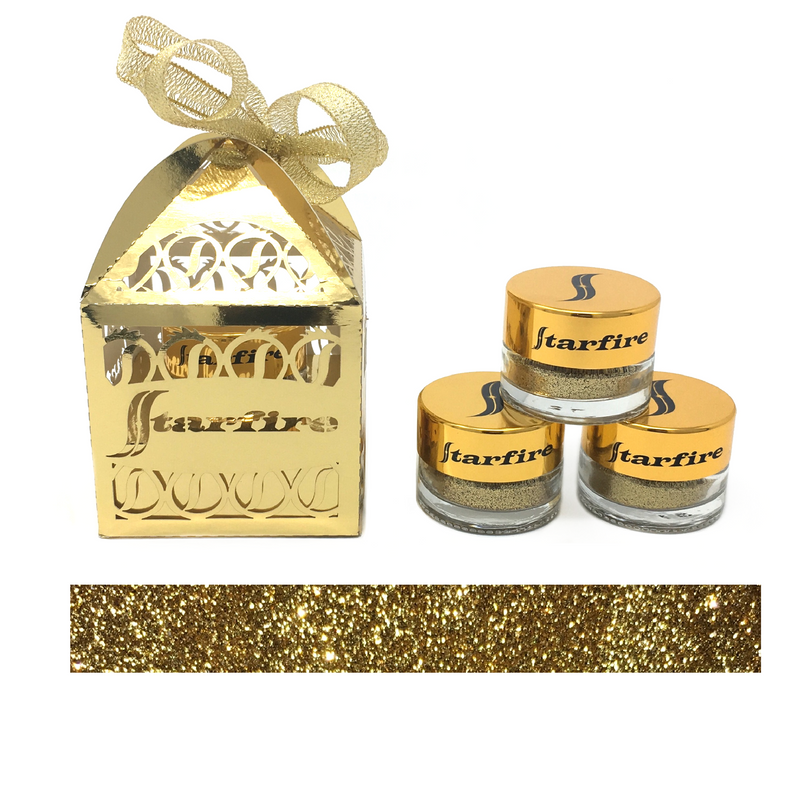 gold glitter next to gold package-starfire cosmetics