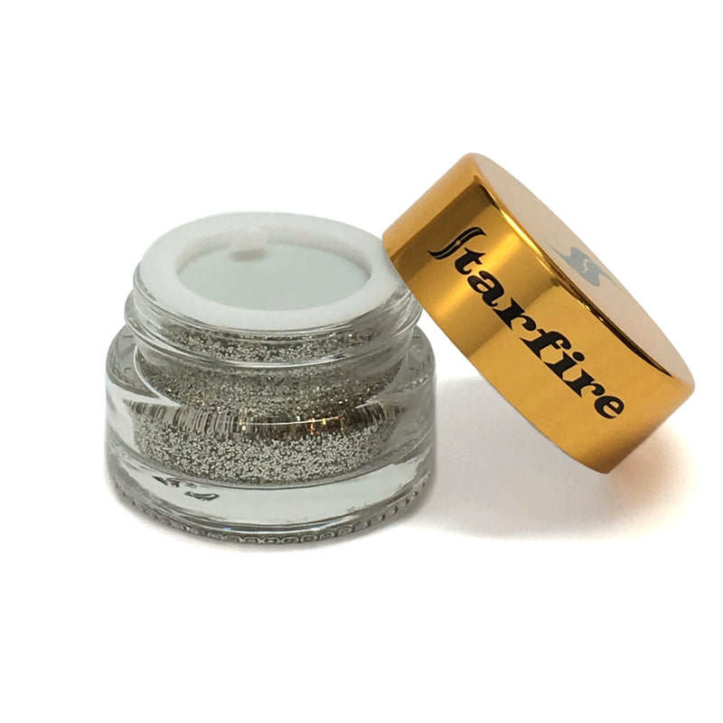 silver glitter in glass jar open with gold lid-starfire cosmetics