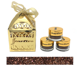 brown glitter next to gold box-starfire cosmetics