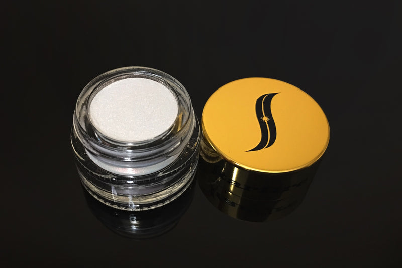 iridescent eye makeup inside glass jar with gold lid-starfire cosmetics