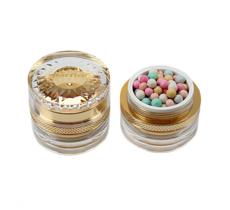 lightweight powder opened inside a gold jar-starfire cosmetics