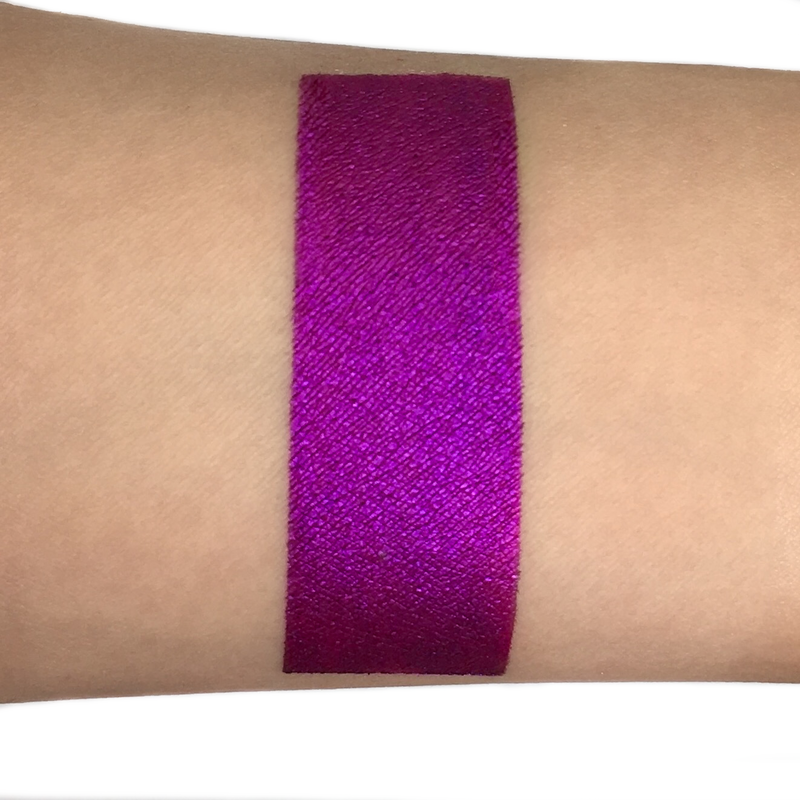 purple matte liquid lipstick on arm-starfire cosmetics