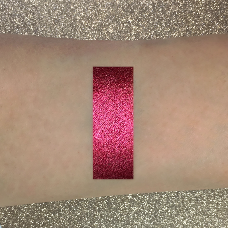 red pigmented eyeshadow on arm-starfire cosmetics