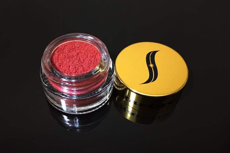 red eyeshadow inside glass jars with gold lid-starfire cosmetics