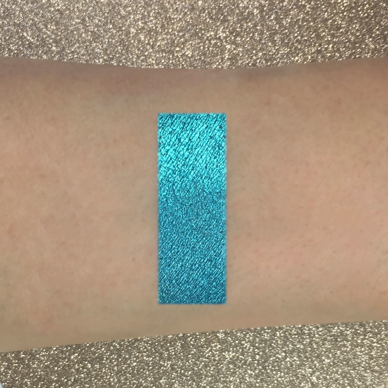 turquoise eyeshadow makeup on arm-starfire cosmetics